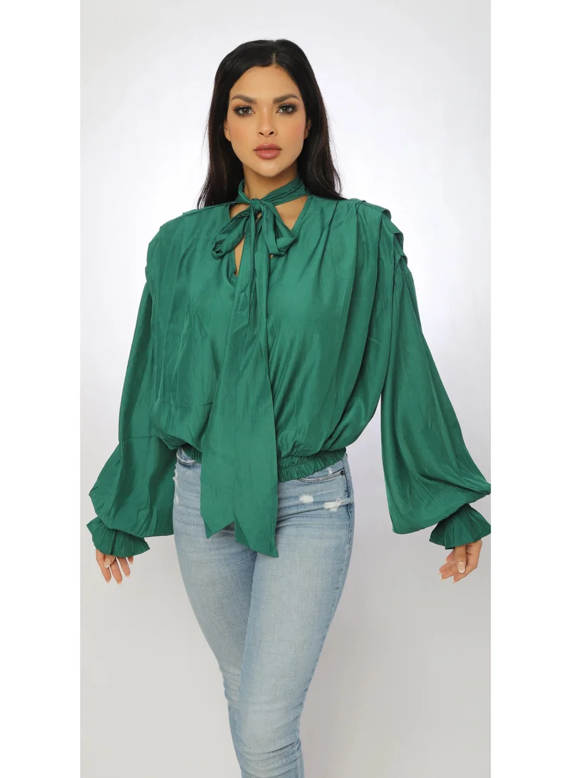 توترندس بلوزة اخضر واسعة وخصر مطاطي